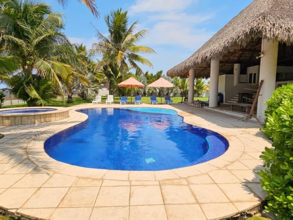 Luxury Oceanfront Estate with Pool, Rancho & Development Lot in Monterrico