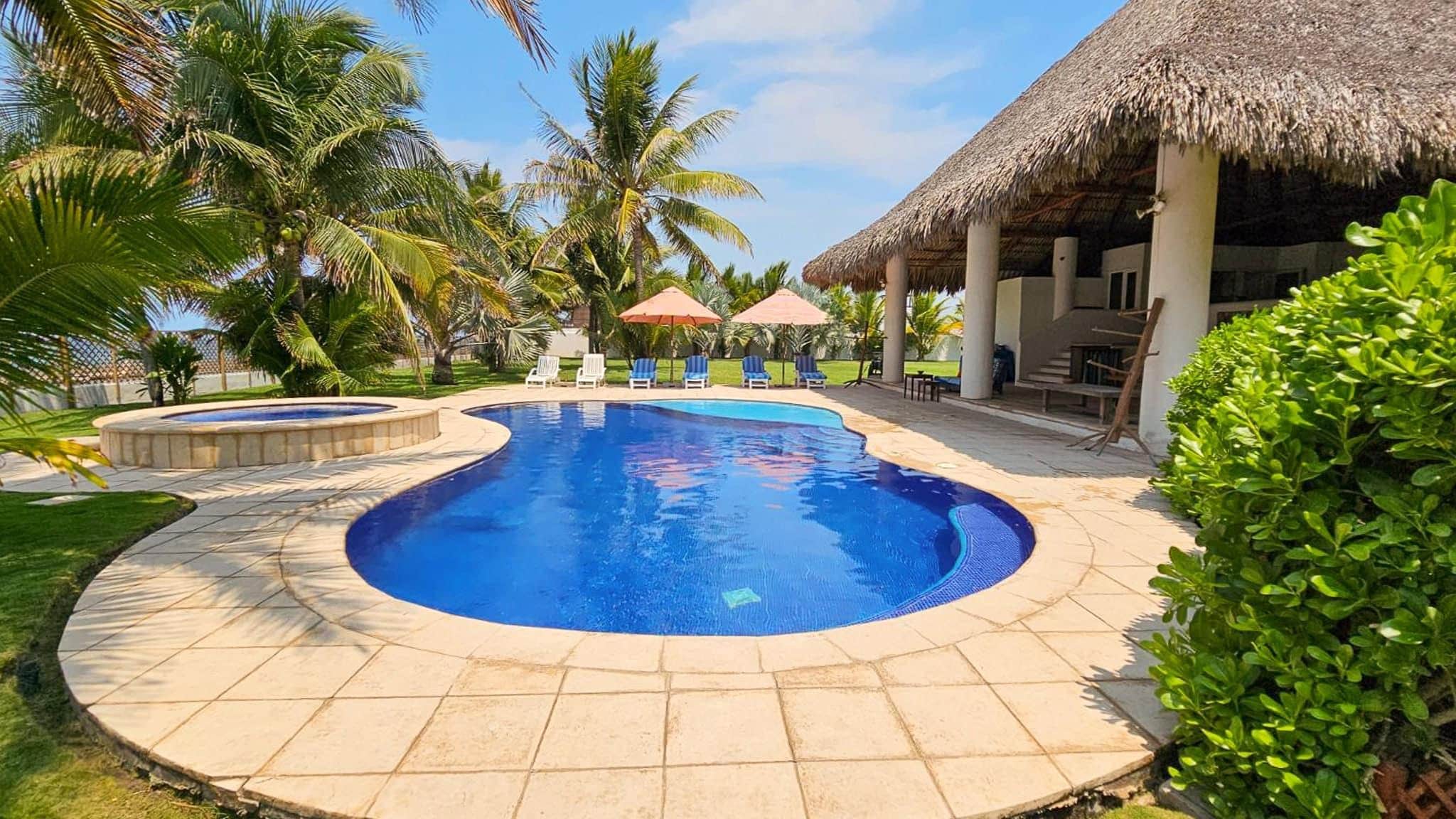 Luxury Oceanfront Estate with Pool, Rancho & Development Lot in Monterrico