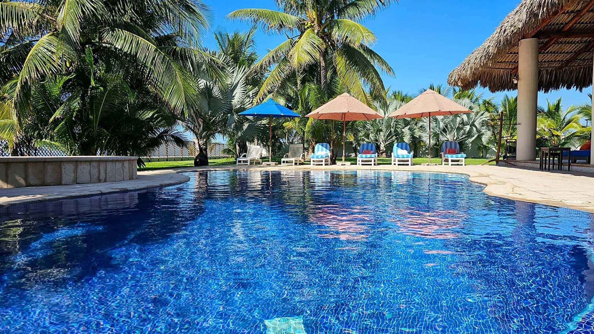 Luxury Oceanfront Estate with Pool, Rancho & Development Lot in Monterrico