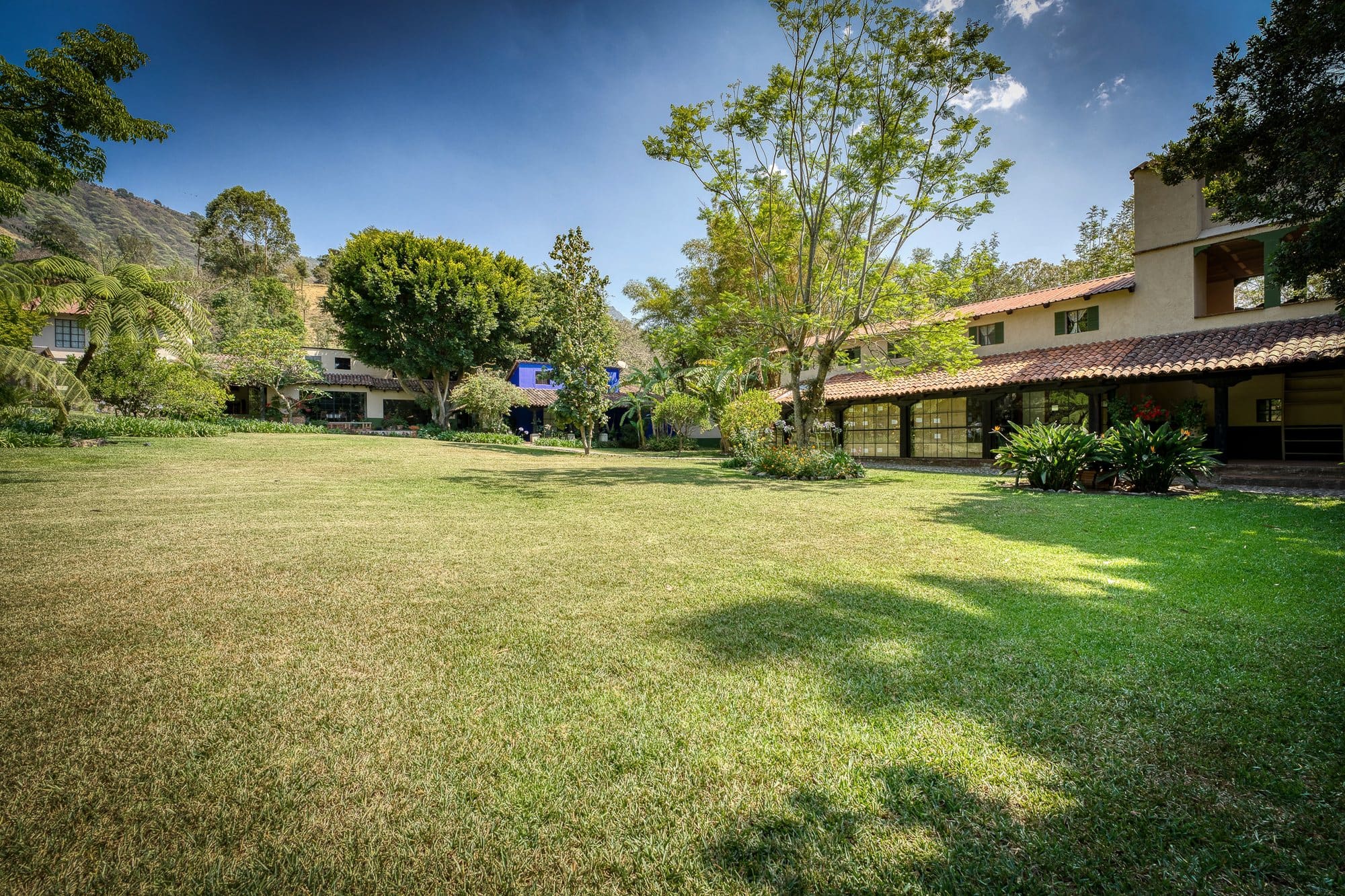 The open lawn and garden buildings, room for an event setup